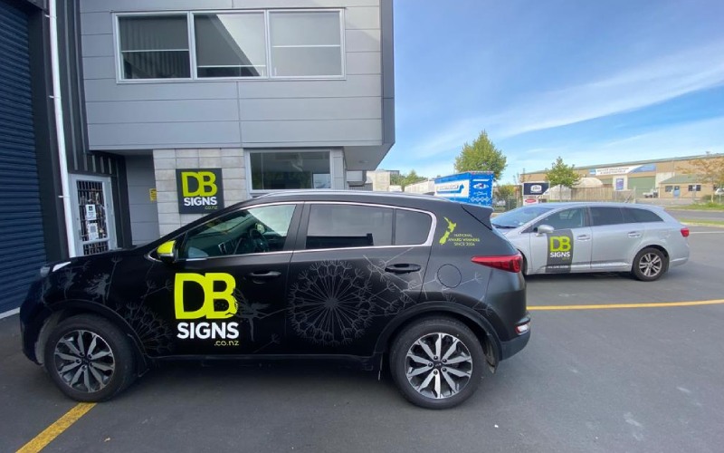 Black Car With DB Signs Decals